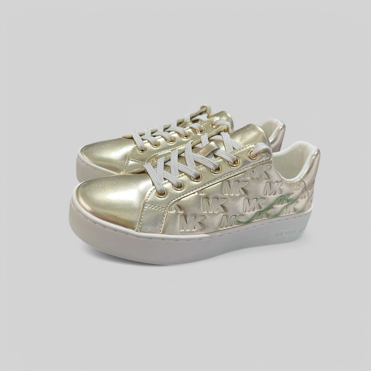 ZAPATILLA DORADA MUJER MK